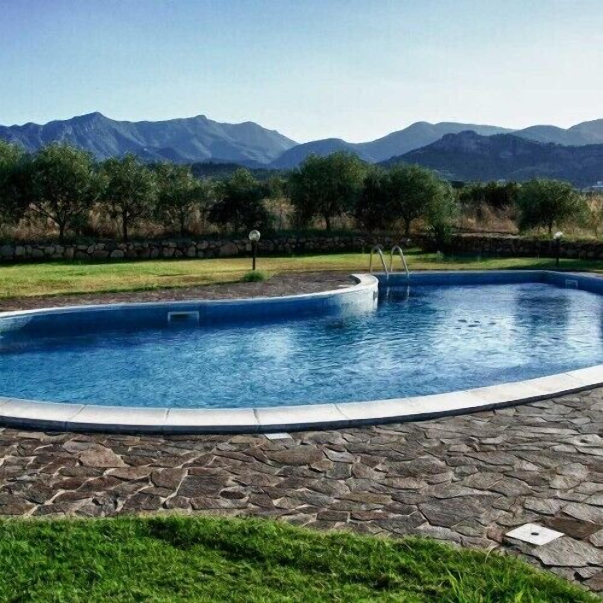 Seasonal outdoor pool, open 8:30 AM to 8:30 PM, pool umbrellas