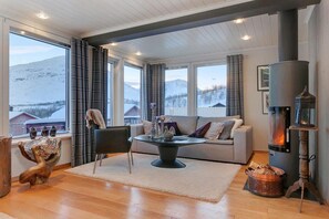 Cottage, 3 Bedrooms | Living room | Flat-screen TV, fireplace - RIBO Apartment Katterjokk (Riksgränsen)