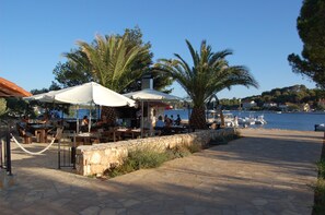 Lunch, dinner served; local and international cuisine, beach views