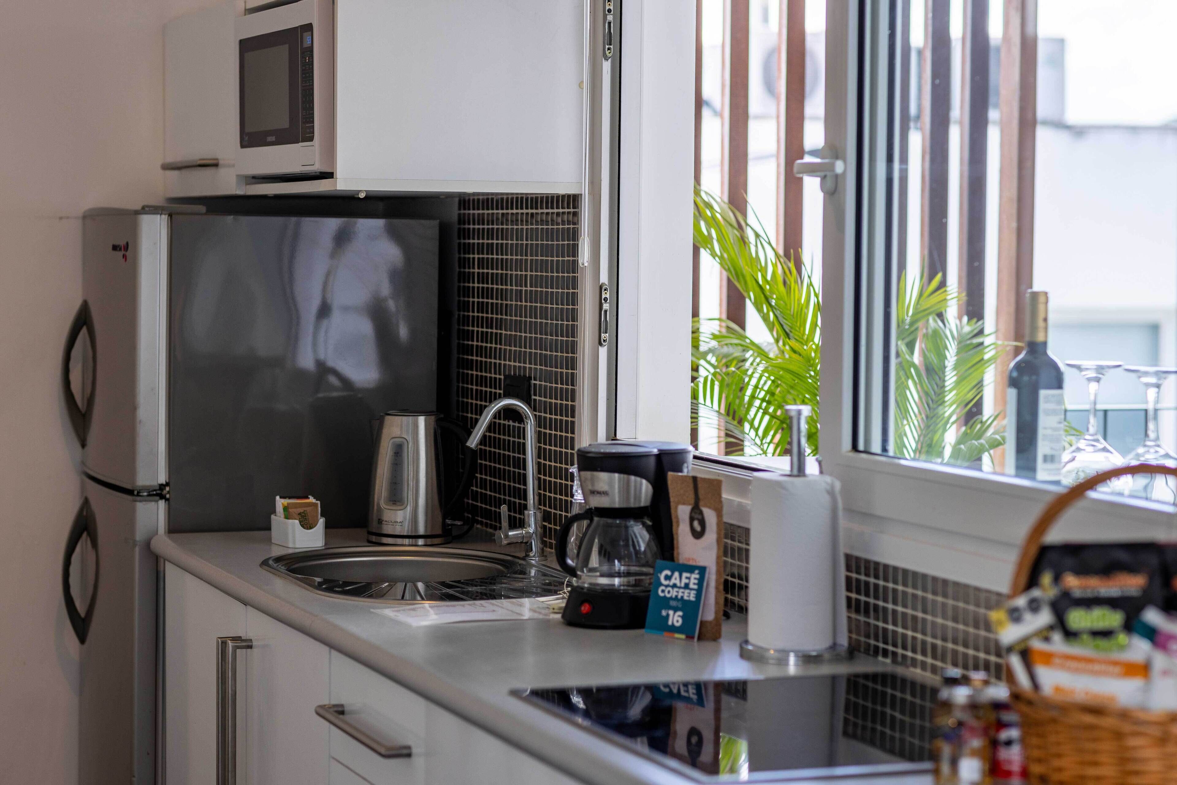 senior suite | private kitchen | microwave, cookware/dishes/utensils