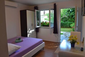 Superior Studio | Living area | Flat-screen TV