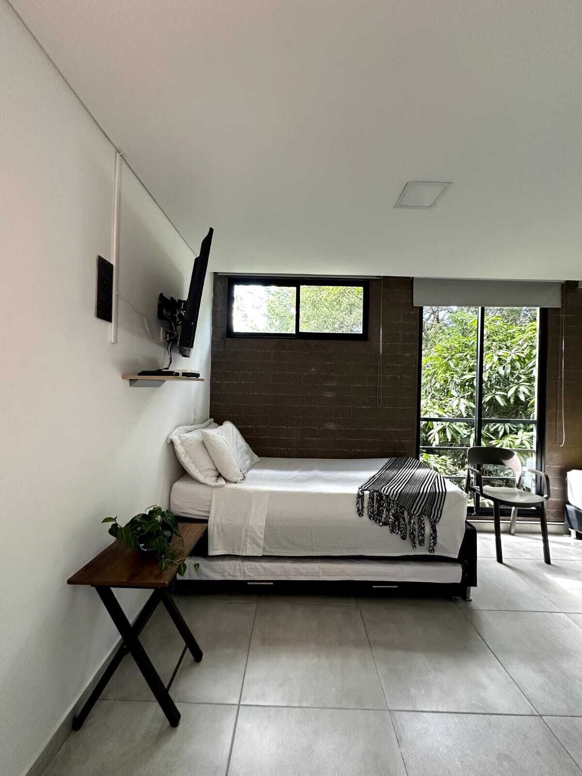 quadruple room, jetted tub | blackout curtains, free wifi, bed sheets