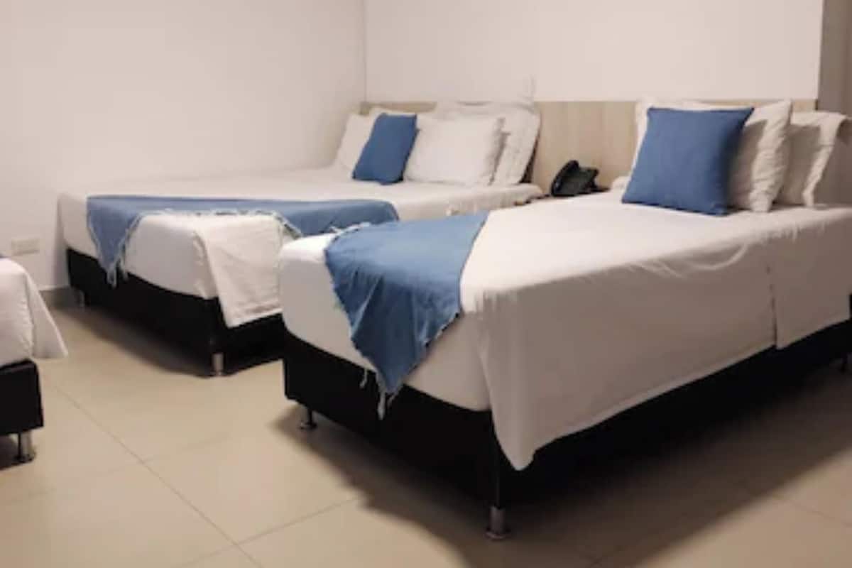 Quadruple Room | Blackout drapes, WiFi (free), bed sheets