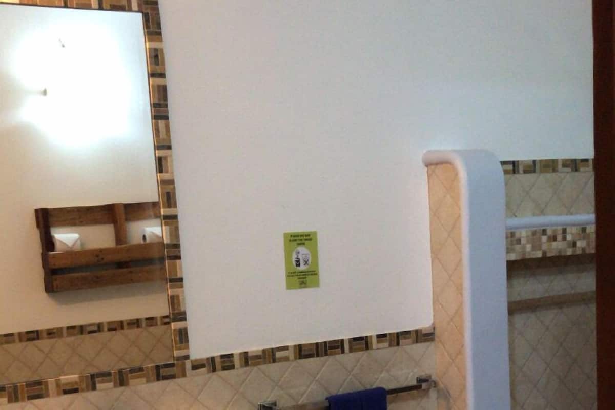 Villa, Garden View | Bathroom | Shower, hair dryer, towels