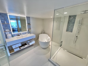 Penthouse Oceanfront Suite | Bathroom | Shower, rainfall showerhead, designer toiletries, hair dryer