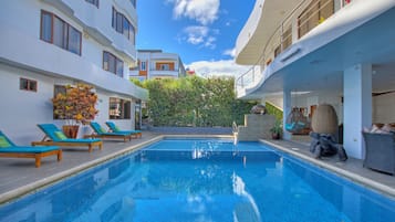 Outdoor pool, sun loungers