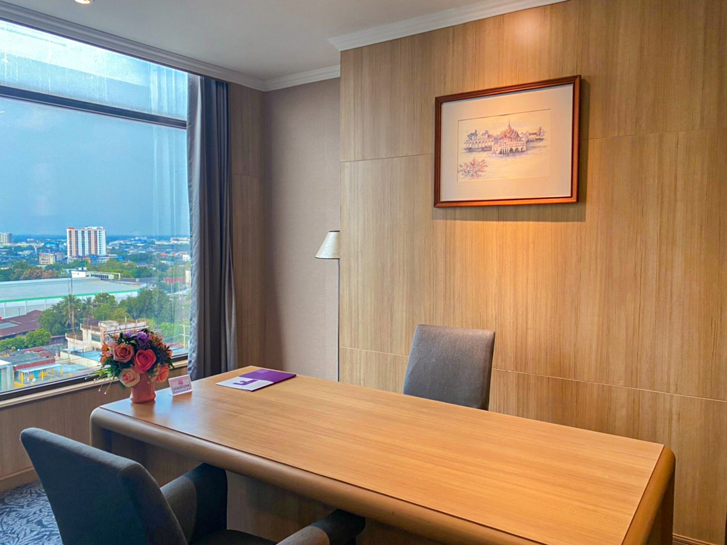 suite with city view | living area | flat-screen tv