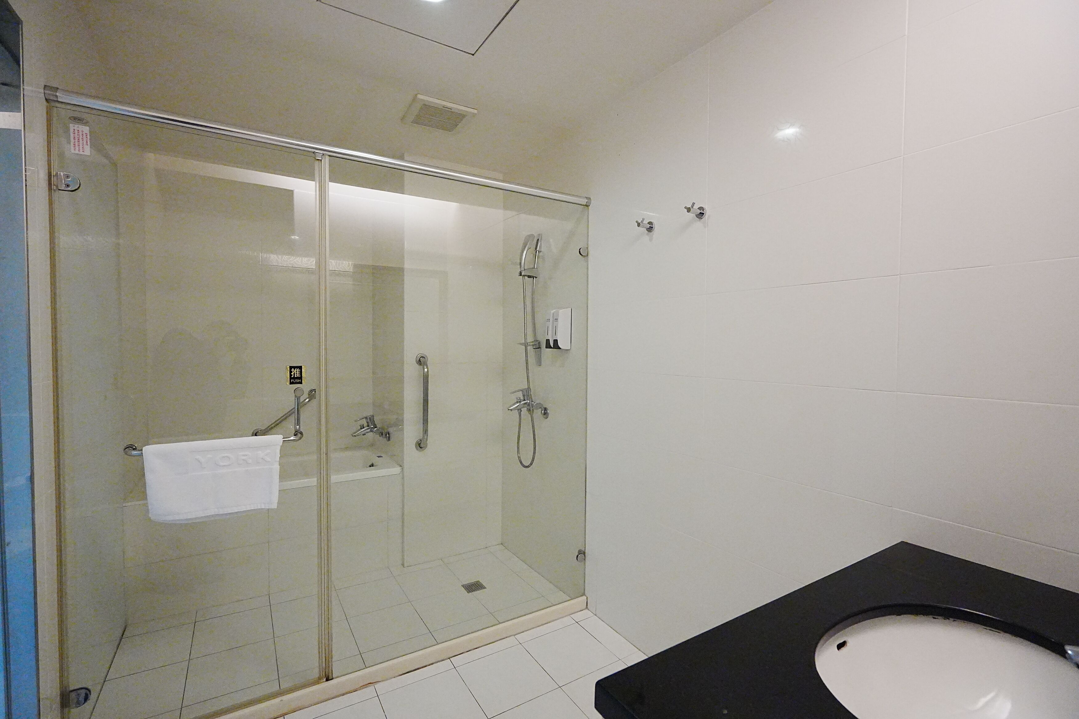 standard double room | bathroom | hair dryer, slippers, towels