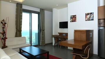 Suite Luxe, vue montagne | Salle de séjour