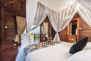 Bungalow, pemandangan kebun | Minibar, brankas, tirai kedap cahaya, dan Wi-Fi gratis