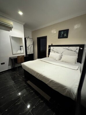 Chambre Triple Deluxe, 1 très grand lit