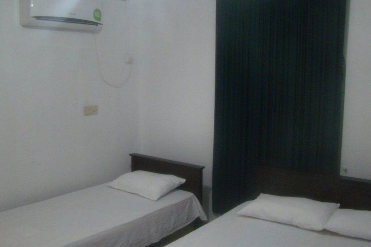 Basic Double or Twin Room, 1 Bedroom, Garden View | Desk, iron/ironing board (on request), WiFi (free)