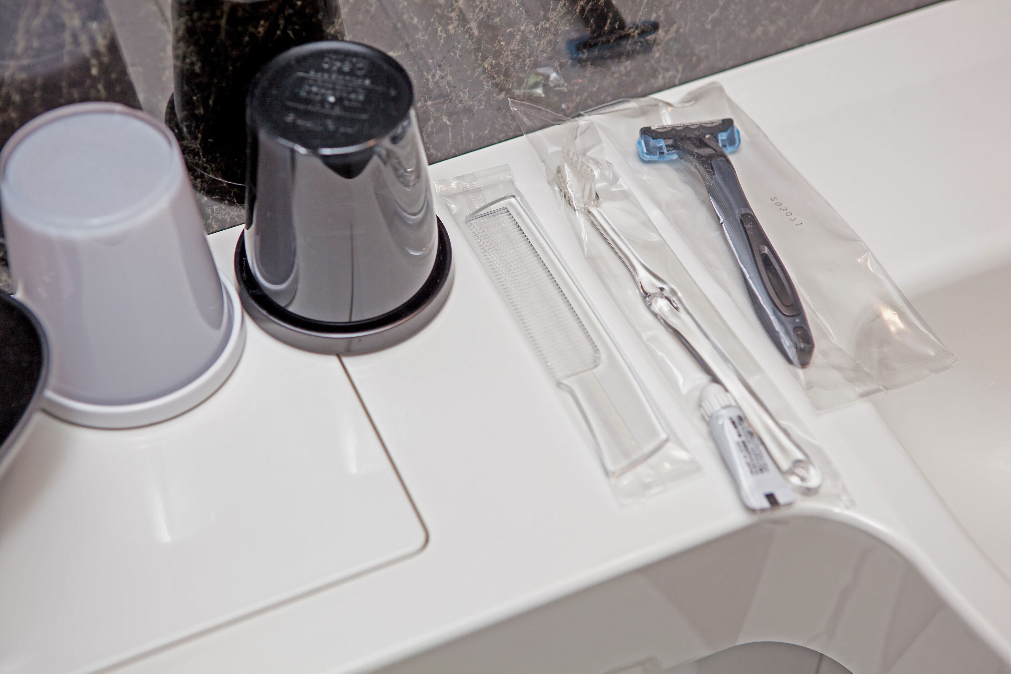 combined shower/bathtub, free toiletries, hair dryer, slippers