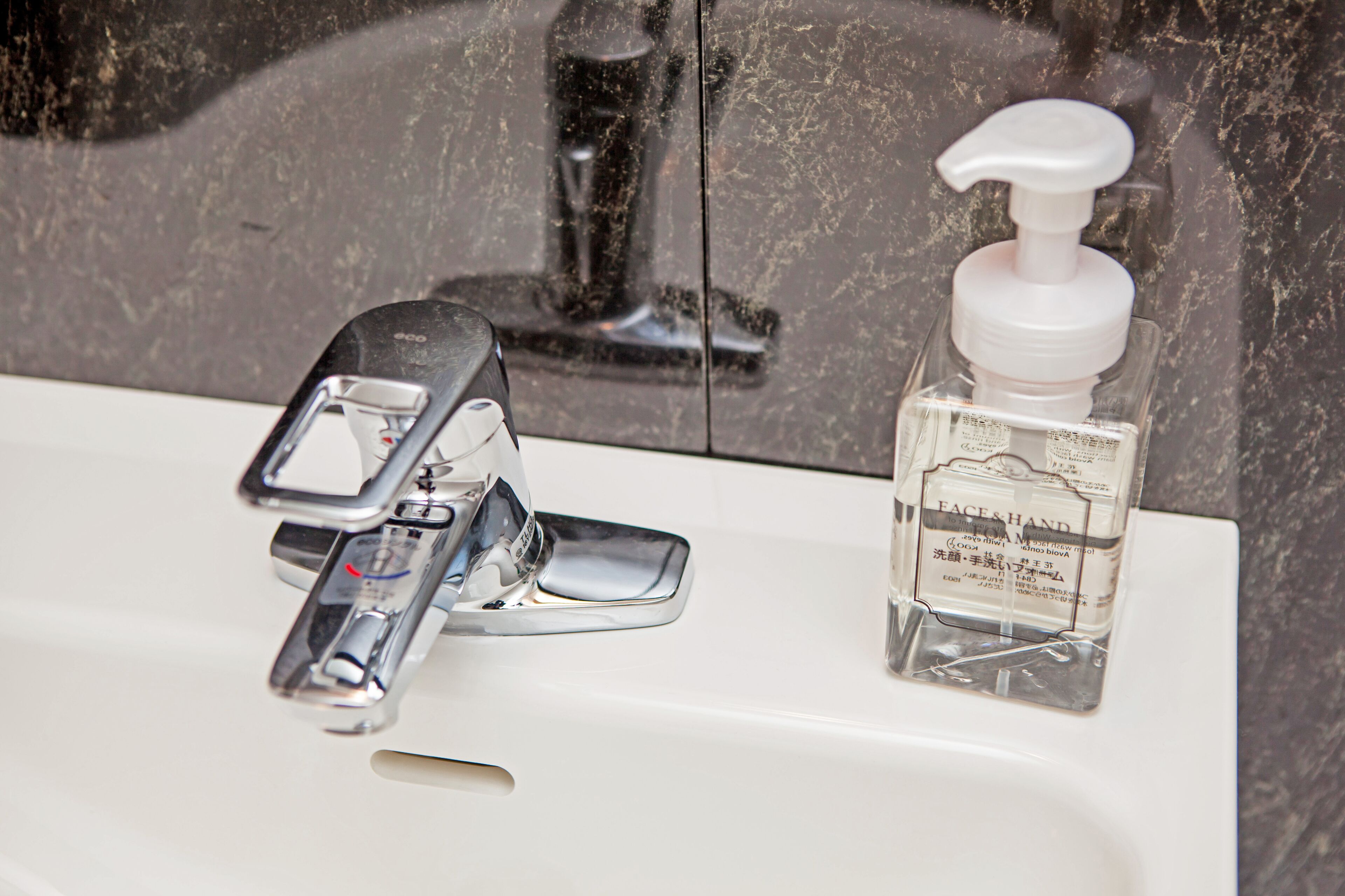 combined shower/bathtub, free toiletries, hair dryer, slippers