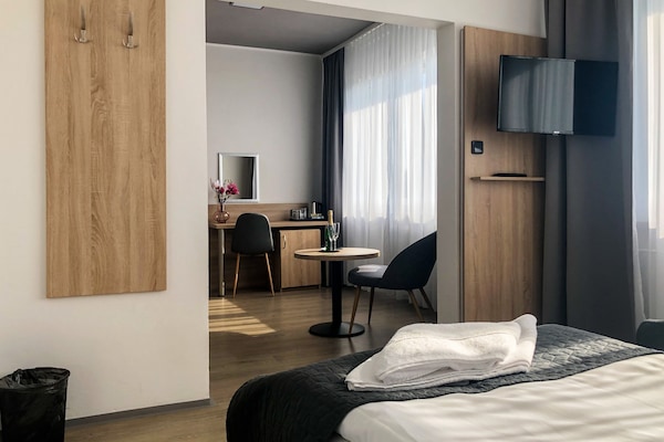 Comfort Quadruple Room | Desk, blackout drapes, free WiFi, bed sheets