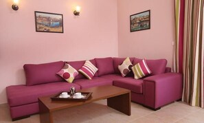 Suite, hidromasaje | Sala de estar | Televisión