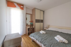 Standard Apartment, 1 Bedroom, Balcony, Sea View | 1 bedroom, premium bedding, in-room safe, individually decorated