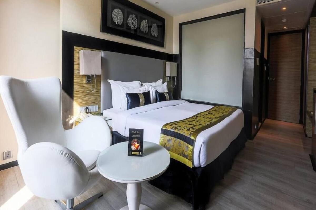Ropa de cama de alta calidad, minibar, caja fuerte y escritorio