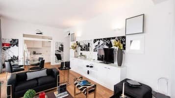 Appartamento Deluxe - Corso Elia Rainusso 20 | Area soggiorno | TV a schermo piatto
