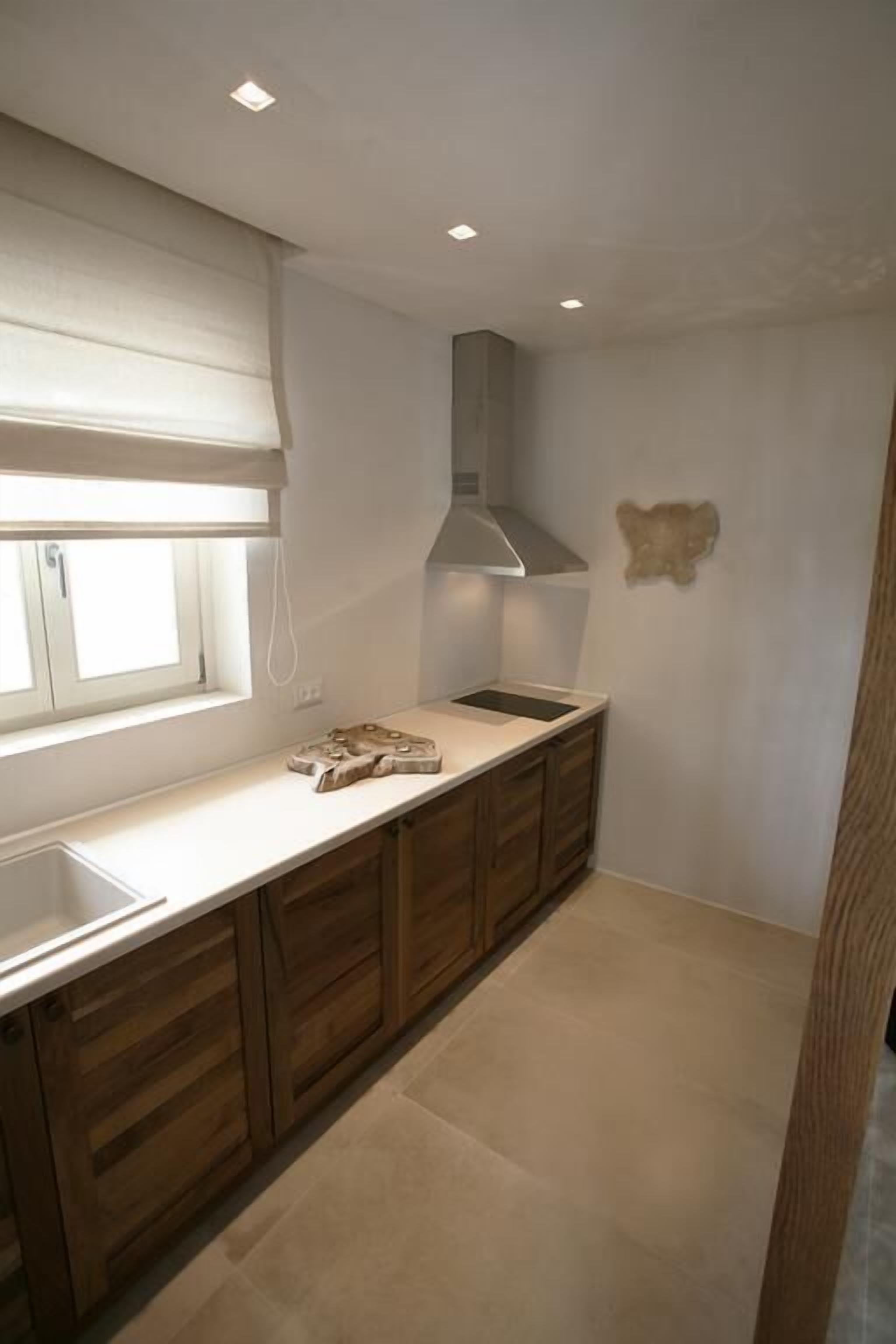 fridge, electric kettle, cookware/dishes/utensils