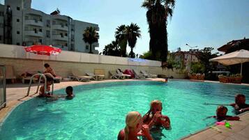 Outdoor pool, pool umbrellas, sun loungers