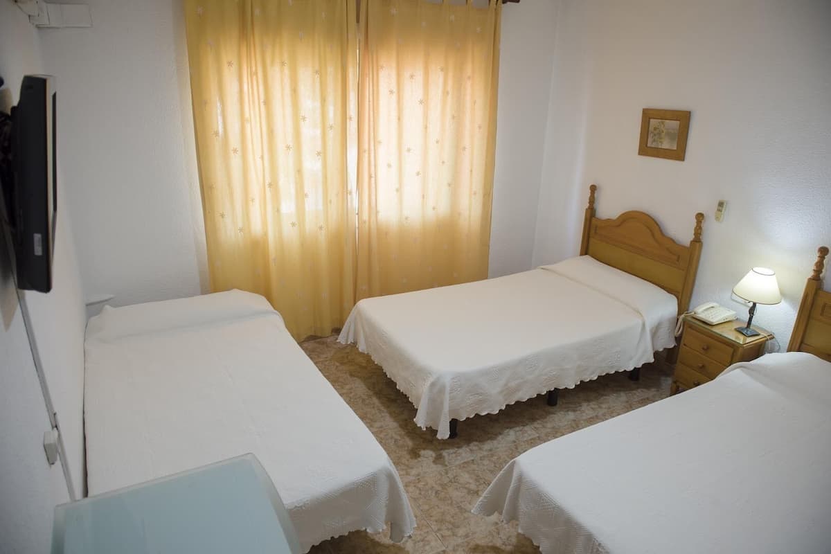 triple room | desk, blackout curtains, free cots/infant beds, rollaway beds