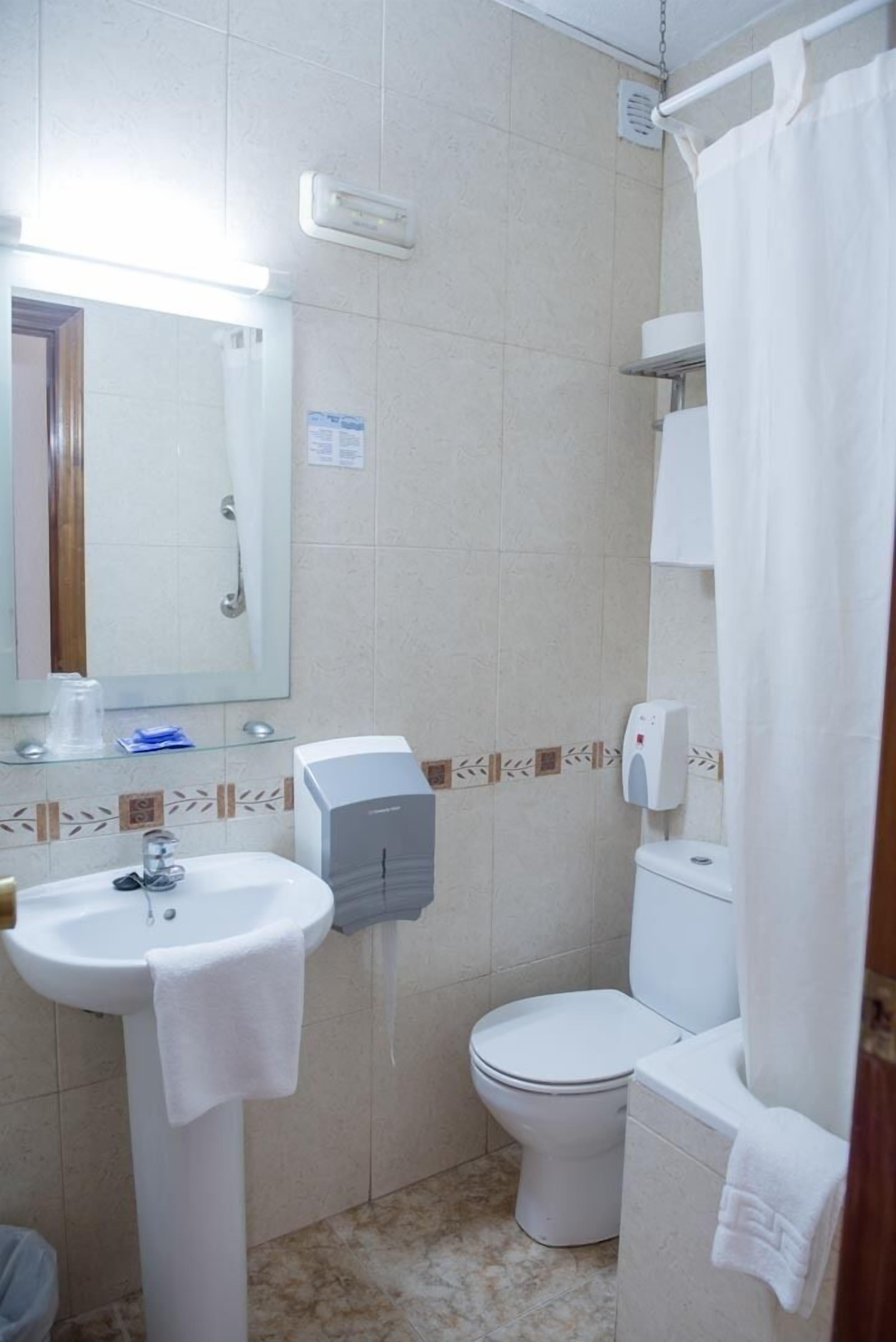 economy single room | desk, blackout curtains, free cots/infant beds, rollaway beds