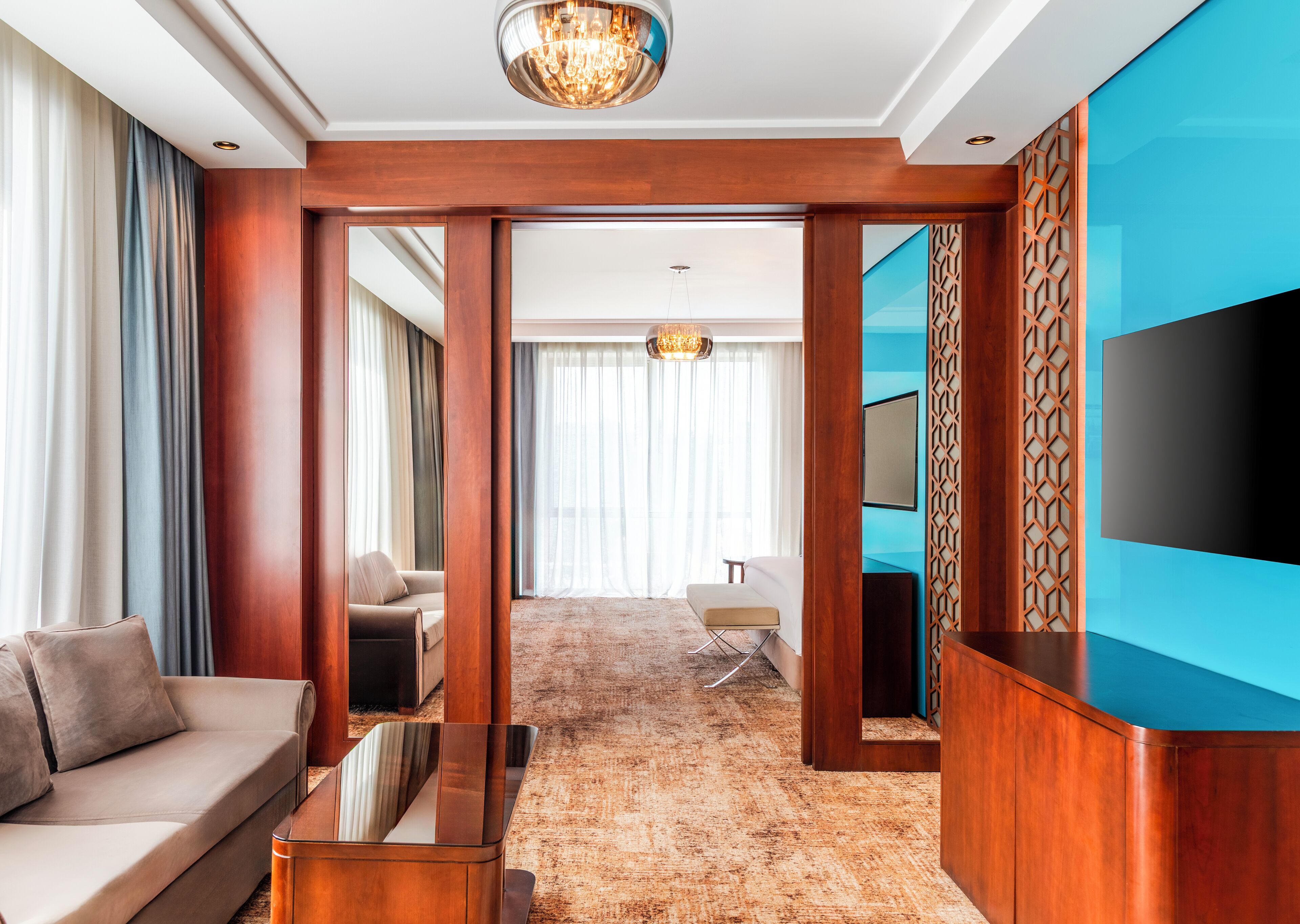 junior suite, 1 king bed | living area | flat-screen tv