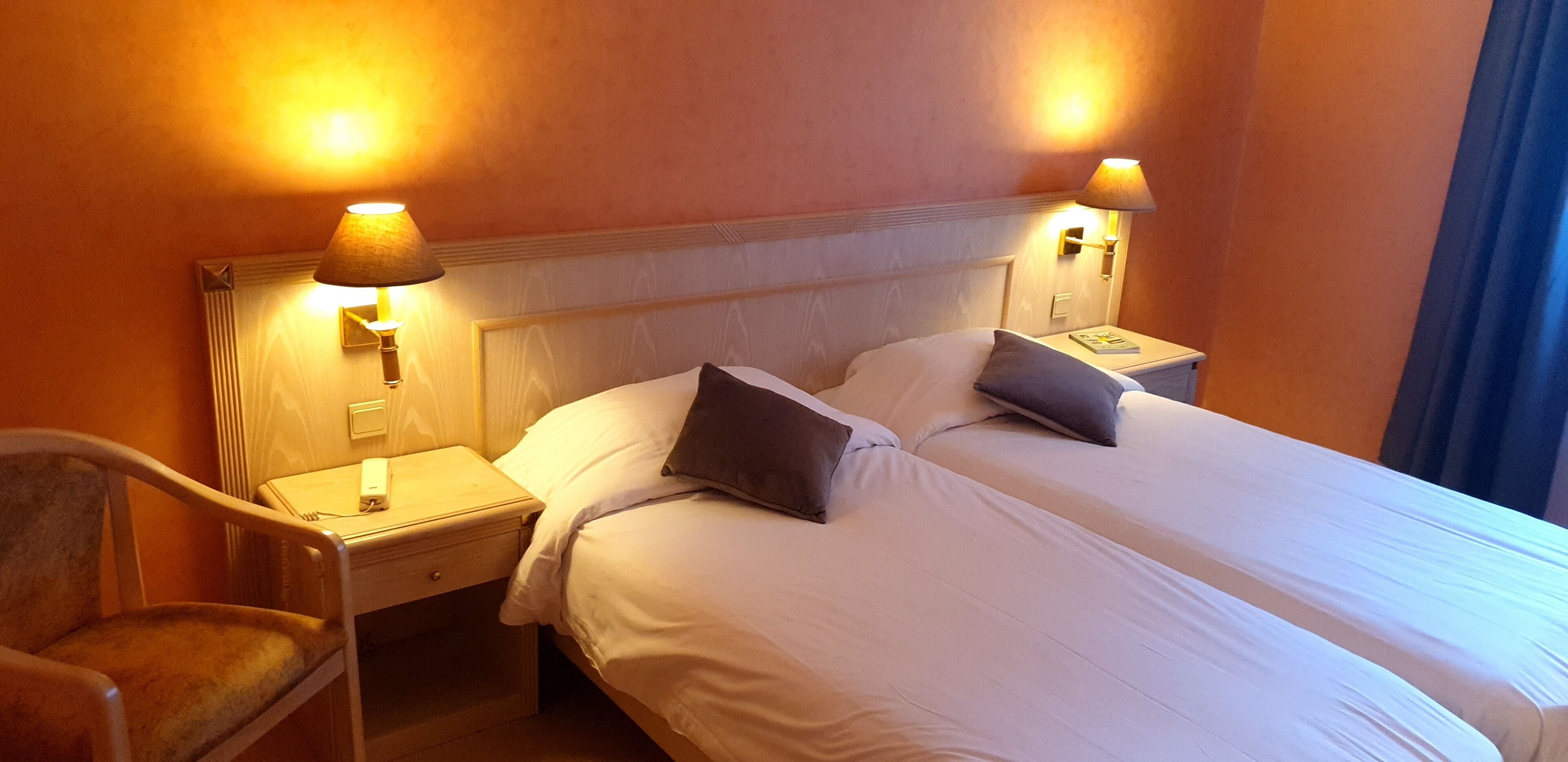 Twin Room | Individually decorated, desk, laptop workspace, blackout drapes