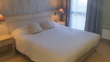 Individually decorated, desk, laptop workspace, blackout drapes