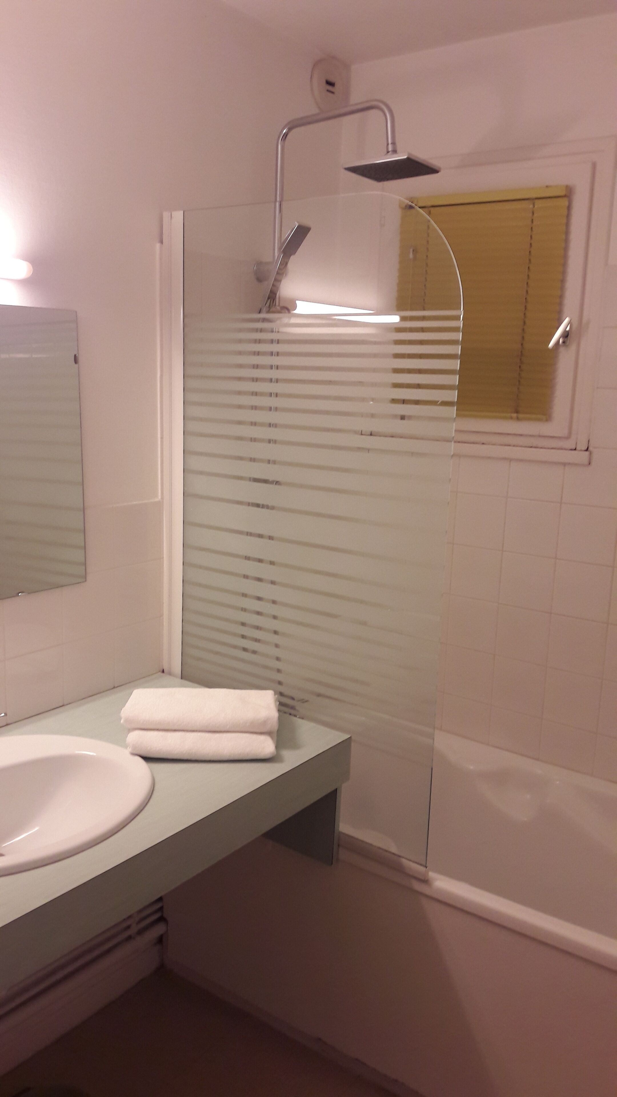 standard quadruple room, garden area | bathroom | rainfall showerhead, hair dryer, towels