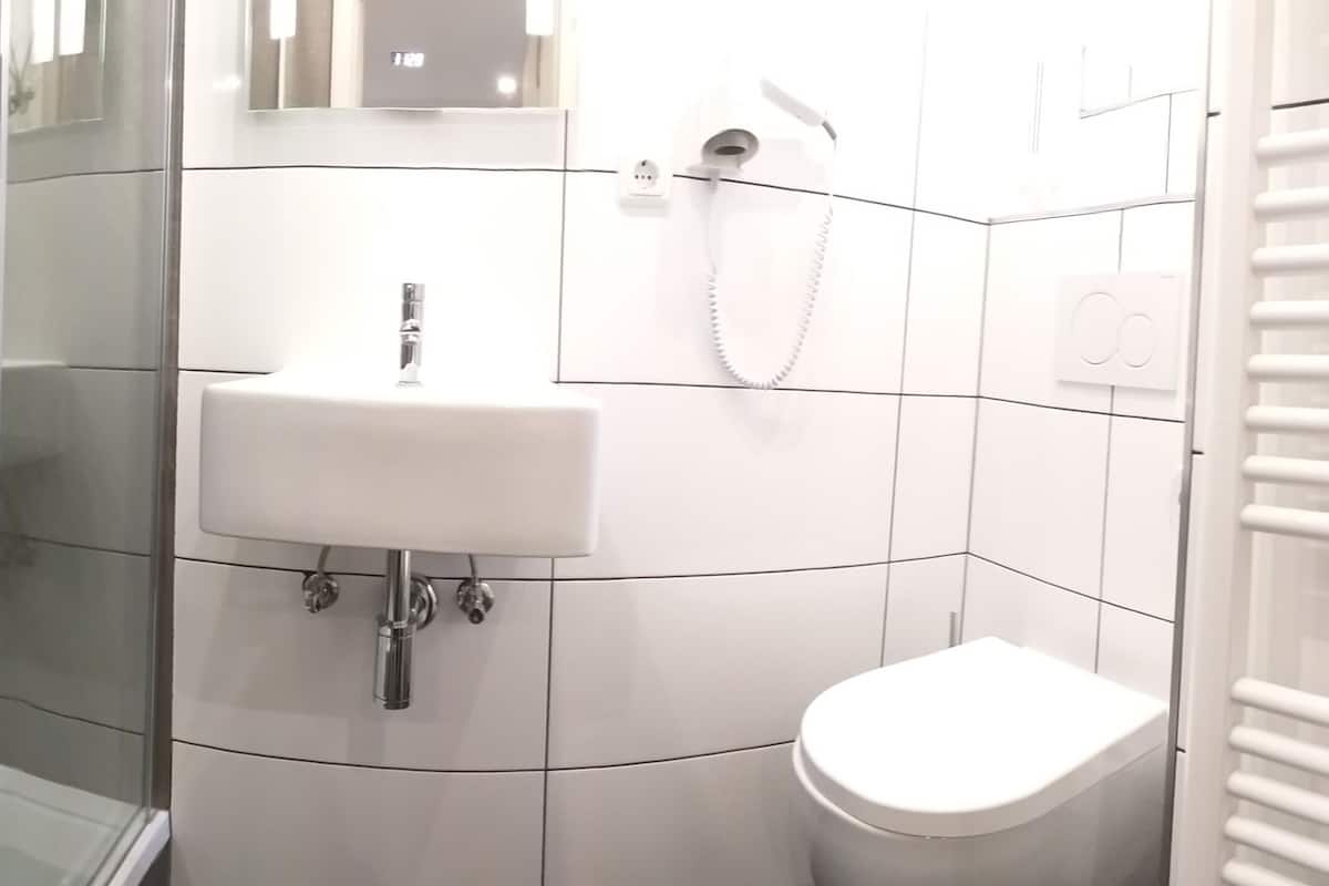 apartment | bathroom | shower, hair dryer, towels