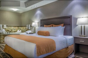 Suite, 1 King Bed, Jetted Tub | Desk, iron/ironing board, free WiFi, bed sheets - Timber Ridge Inn and Suites (Fox Creek)