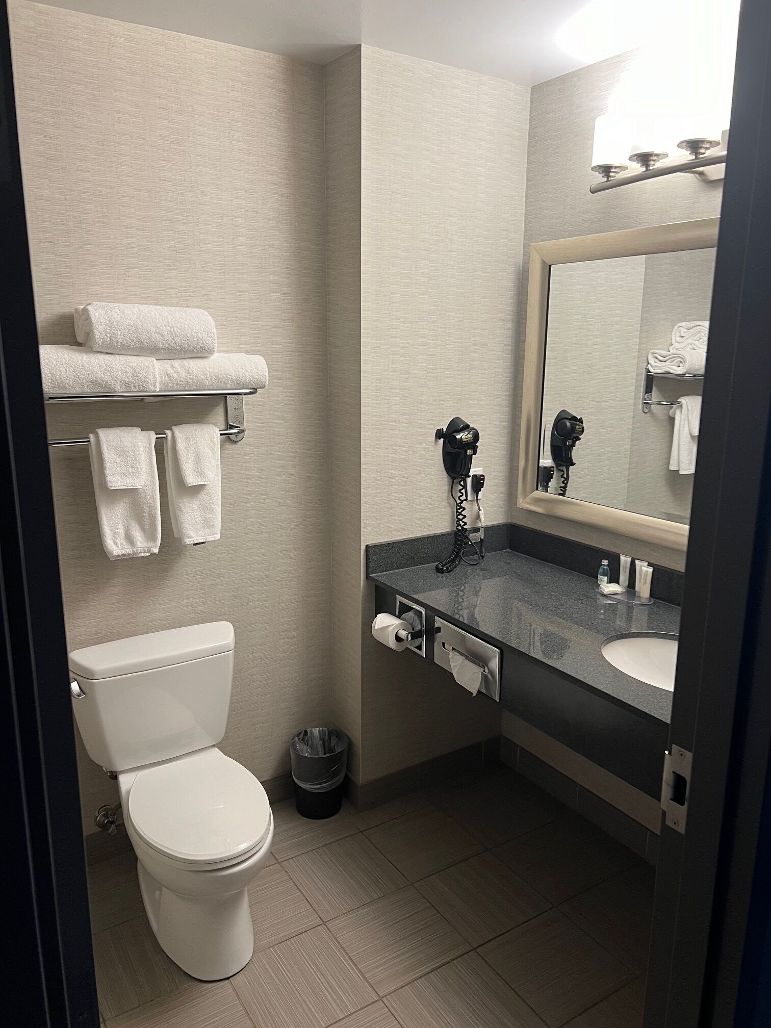 suite, 1 king bed, jetted tub | bathroom | combined shower/bathtub, free toiletries, towels