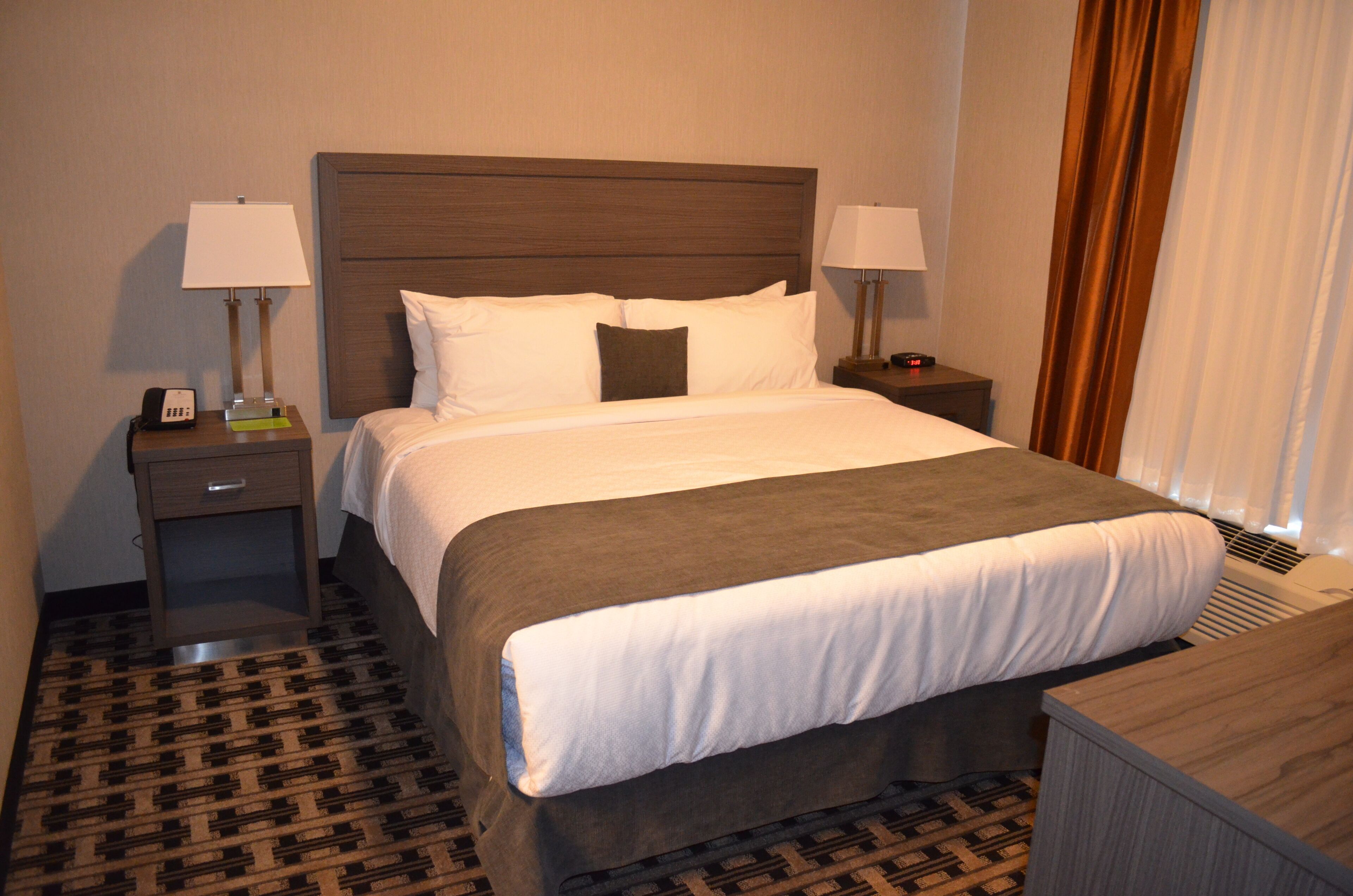 Executive Suite, 1 King Bed, Kitchenette | Desk, iron/ironing board, free WiFi, bed sheets