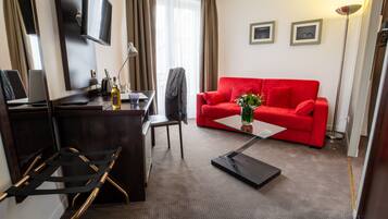 Junior suite | Woonruimte | Flatscreentelevisie