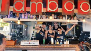 A bar with a 'Tamboo' sign, a coffee machine, and a 'Michelob Ultra' bottle. - Tamboo Beside the Pointe (Rincon)