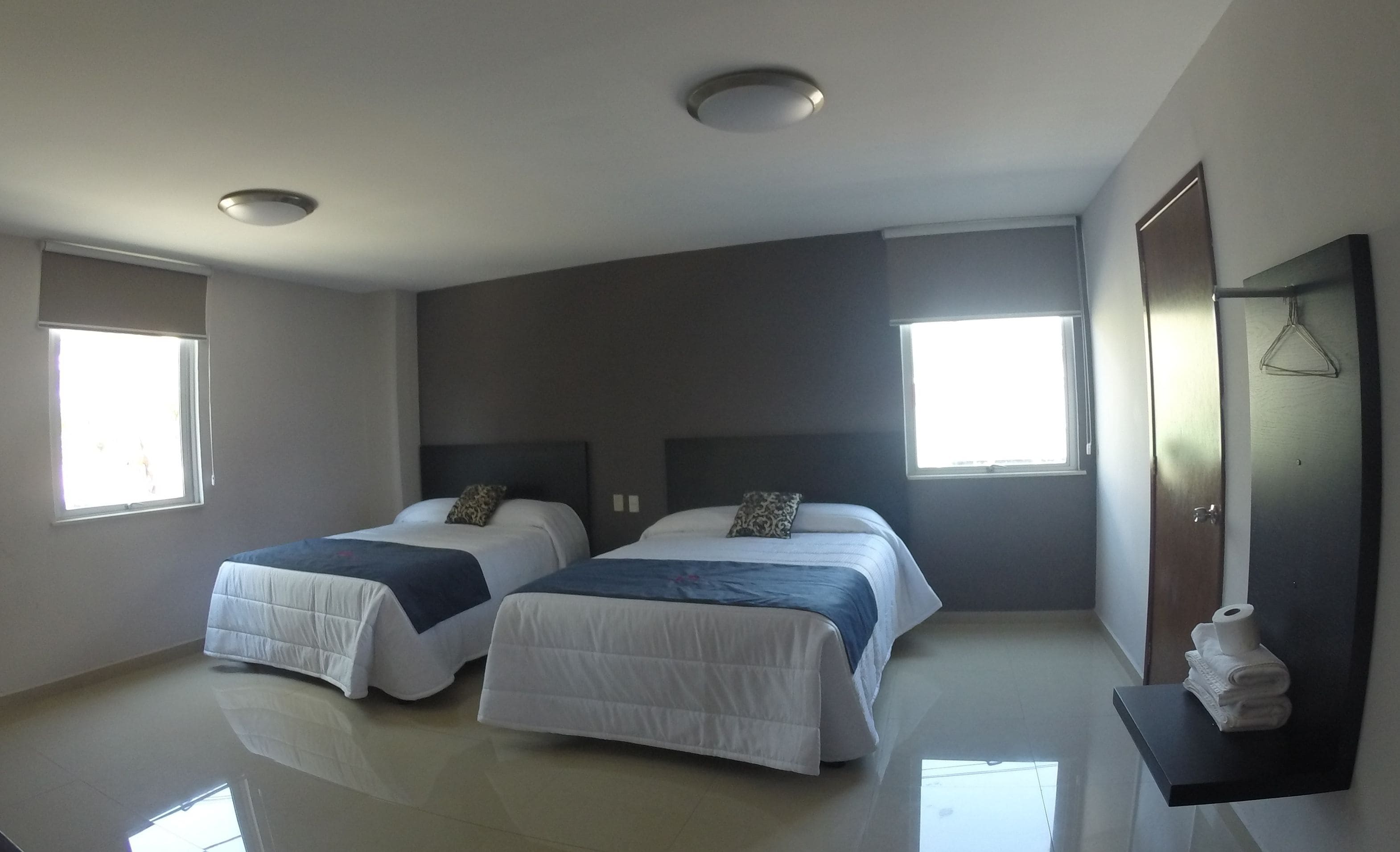 Habitación Deluxe, 2 camas Queen size | Wifi gratis y ropa de cama 