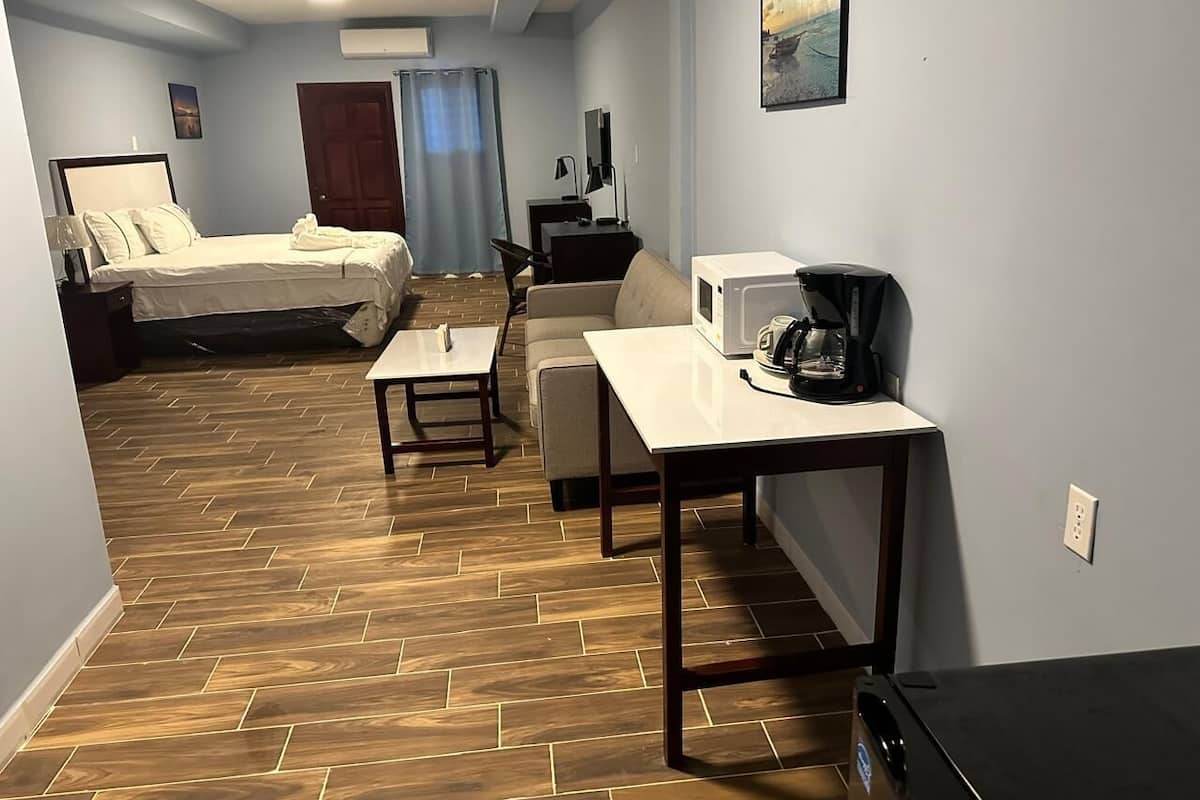 Deluxe Double Room | Pillowtop beds, in-room safe, blackout drapes, iron/ironing board