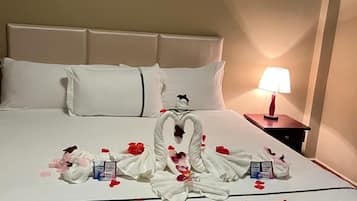 Double Room | Pillow-top beds, in-room safe, blackout curtains, iron/ironing board