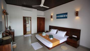 Desk, iron/ironing board, bed sheets