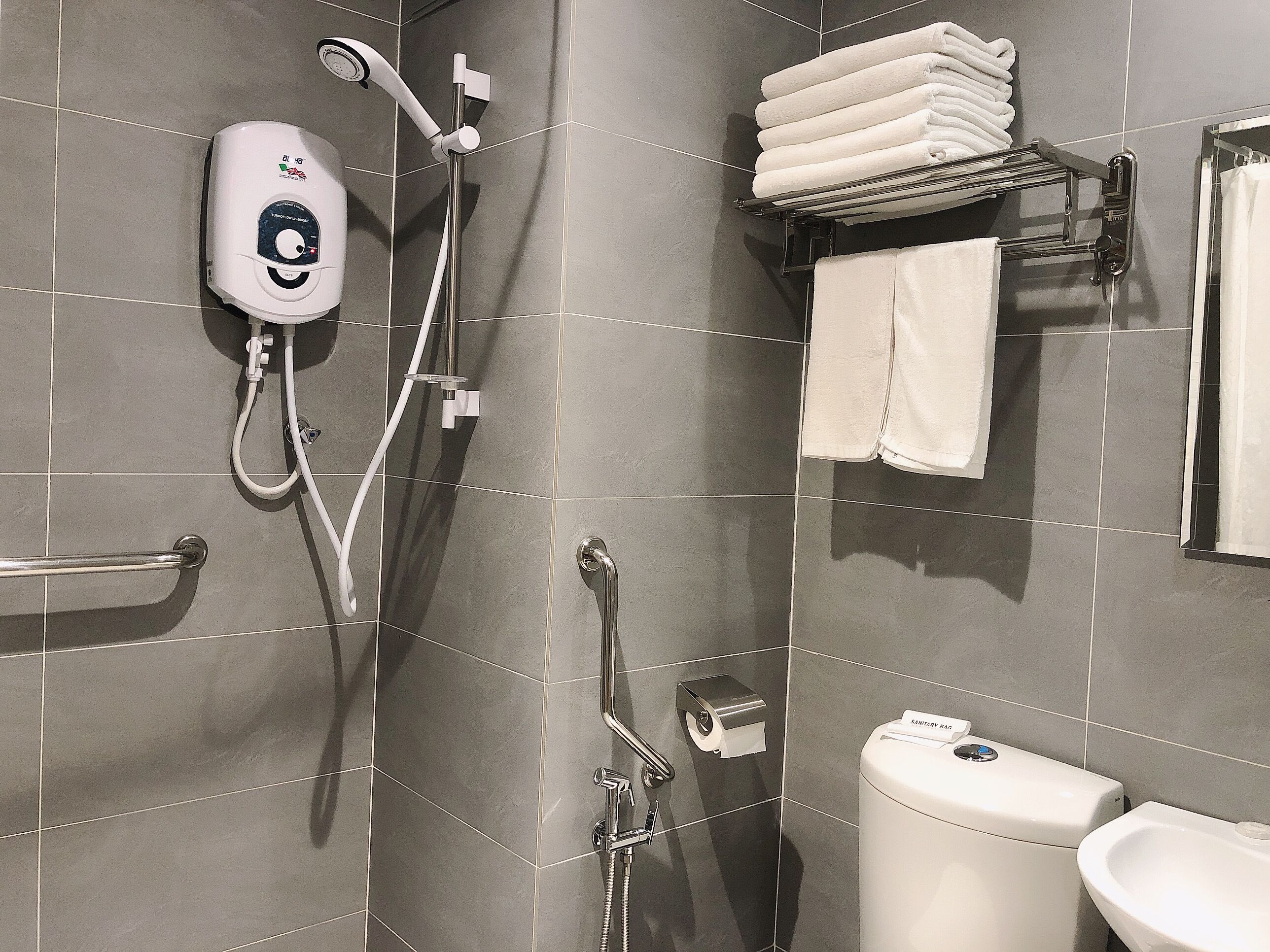 family room | bathroom | shower, rainfall showerhead, free toiletries, hair dryer