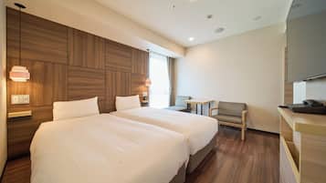 Twin Room, Non Smoking | Down comforters, desk, blackout drapes, iron/ironing board