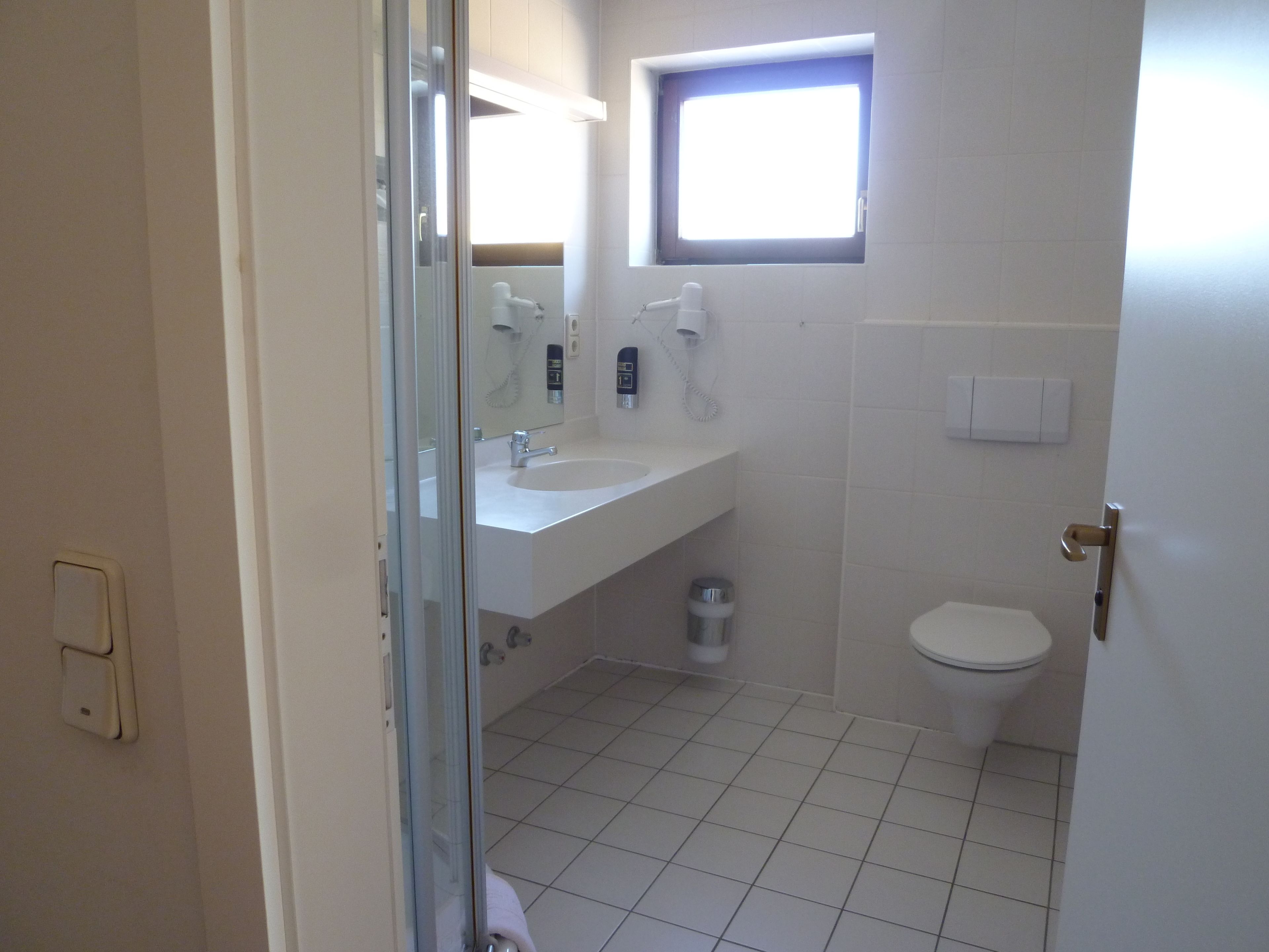 double room single use | bathroom | shower, free toiletries, hair dryer, towels