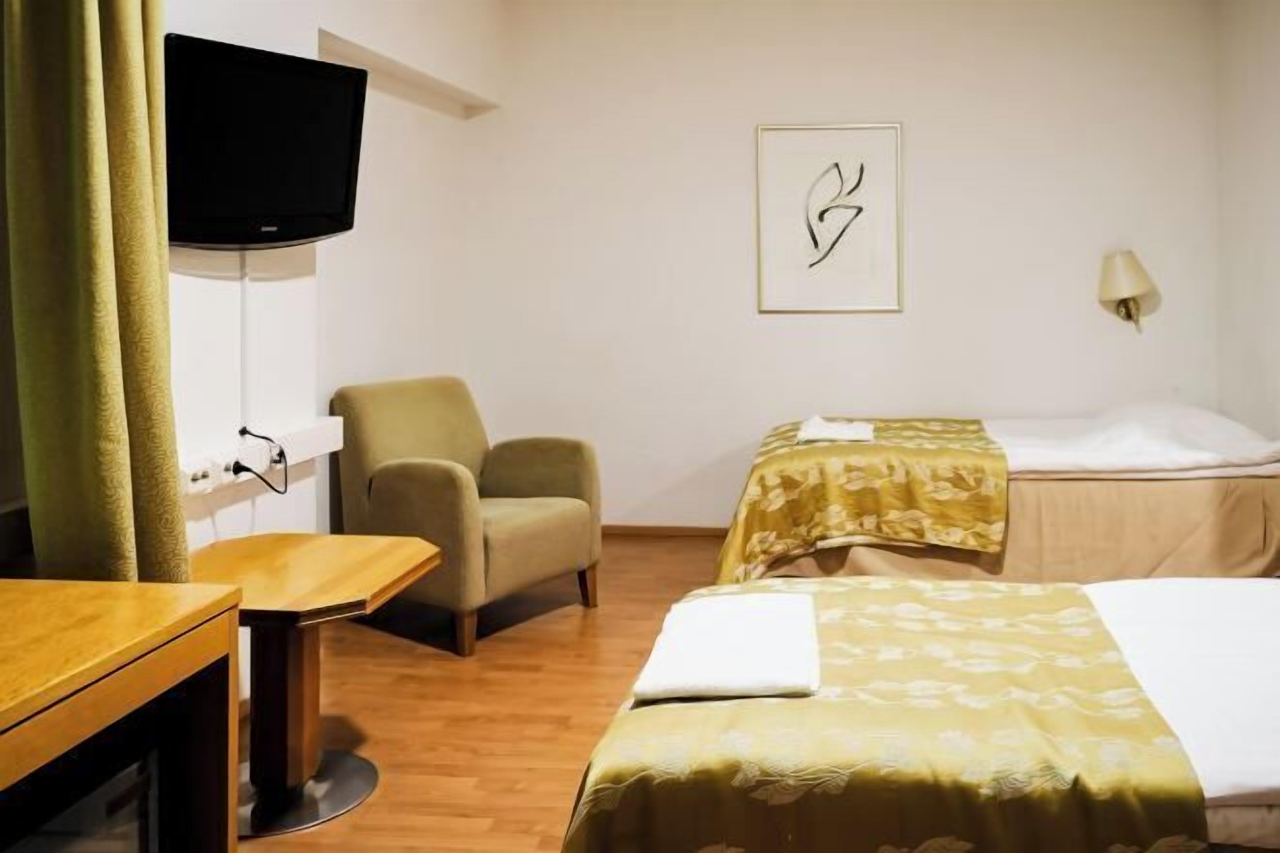 Minibar, desk, laptop workspace, iron/ironing board