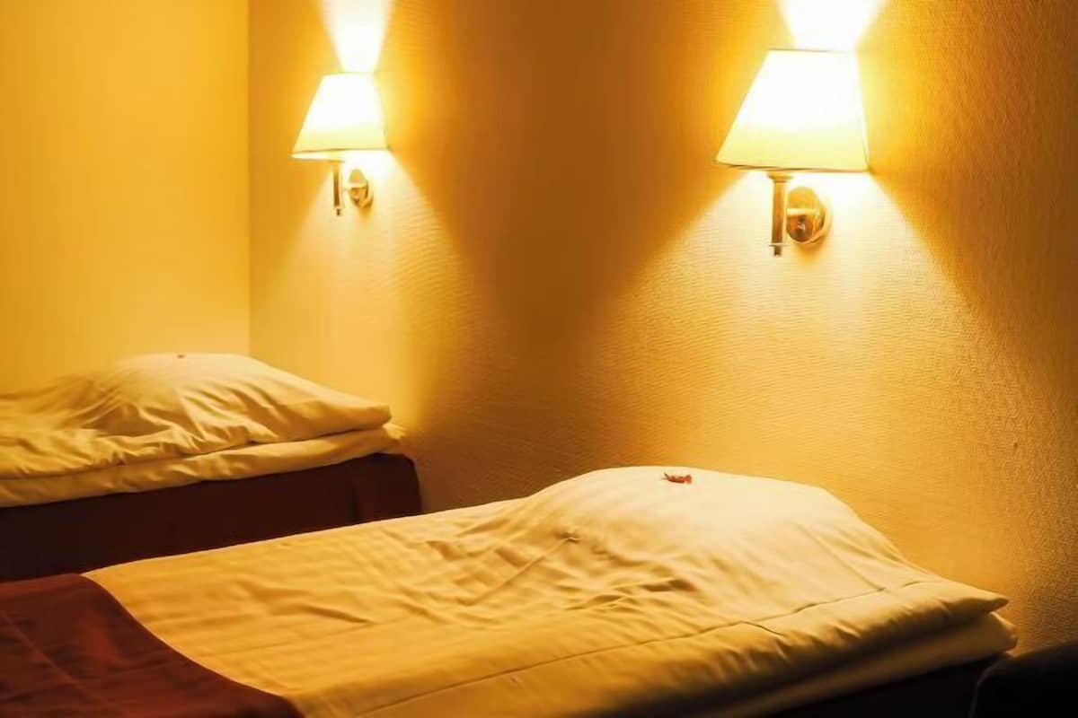 Minibar, desk, laptop workspace, iron/ironing board