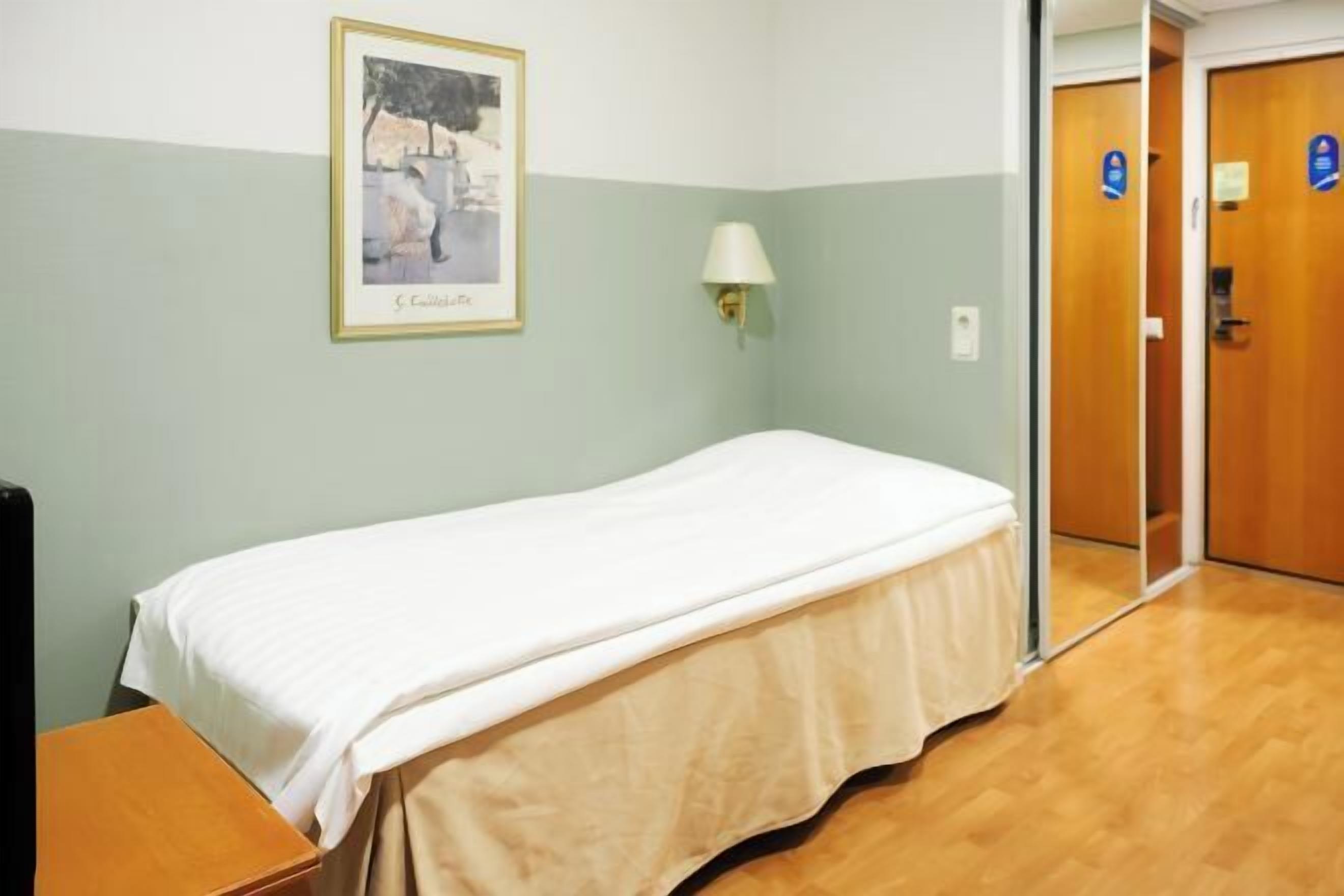 Minibar, desk, laptop workspace, iron/ironing board