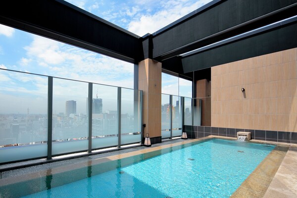Rooftop pool Osaka hotel city views