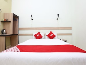 Espacio para trabajar con laptop, wifi gratis y ropa de cama 