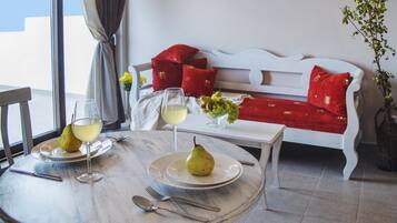 Deluxe Apartment, 1 Bedroom, Sea View | Living area | Flat-screen TV